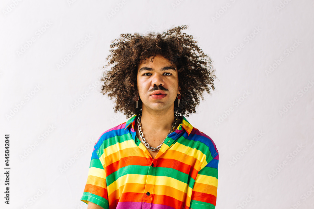 Gay man posing in a studio during pride month Gay man posing in a studio during pride month