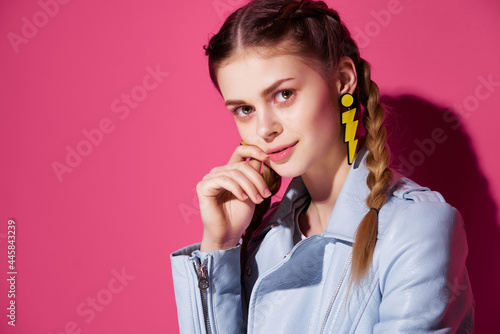 young woman with pigtails blue jacket decoration posing model