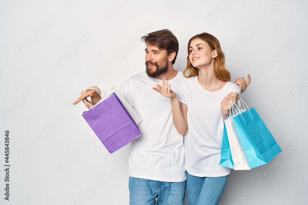 man and woman with packages in hands shopping entertainment lifestyle discount man and woman with packages in hands shopping entertainment lifestyle discount