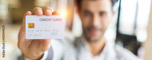 Cuadro en lienzo Close up credit card in the hand of businessman,  purchase and payment concept