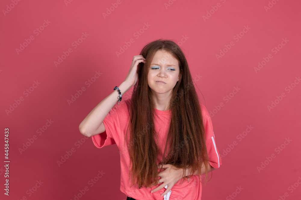 13 years old girl kid in casual isolated on terracotta background suffering from stomach pain 13 years old girl kid in casual isolated on terracotta background suffering from stomach pain