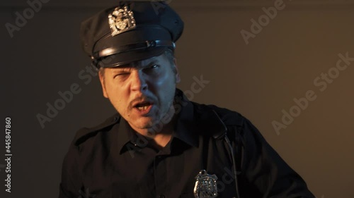 aggressive angry cop fights swears and shouts