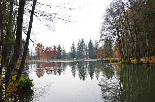 Koseze Pond, Martinek Pond or Lake Koseze is an artificial pond at the edge of Ljubljana, the capital of Slovenia. Park scene during autumn time. photo