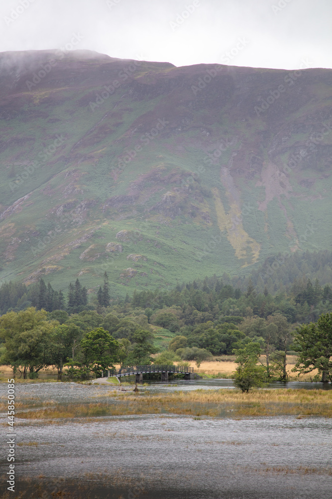 A landscape view of flooded land adjacent to Derwent Water, the Lake District, UK A landscape view of flooded land adjacent to Derwent Water, the Lake District, UK