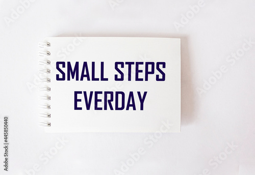 Inspirational quote on white background SMALL STEPS EVERYDAY