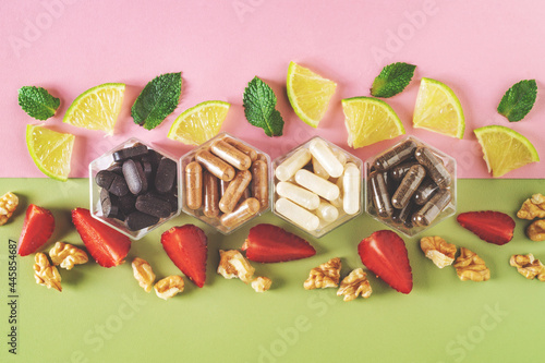 Various capsules with dietary supplements or vitamines photo
