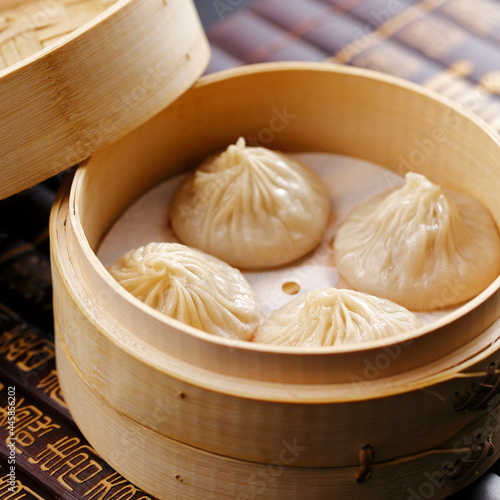 Photography steamed fresh seafood pork meatball dumpling soup colourful Shanghai xiao long b