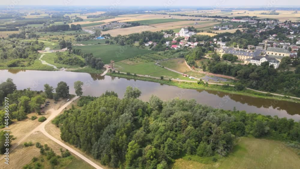 Top view of the city of Drohiczyn on the Bug River.Over the river rises the castle mounain.from the bird's eye view over the city you can see the monastery buildings-Jesuits,Frannciscans,Benedictine Top view of the city of Drohiczyn on the Bug River.Over the river rises the castle mounain.from the bird's eye view over the city you can see the monastery buildings-Jesuits,Frannciscans,Benedictine