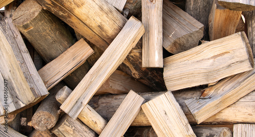 wall firewood , Background of dry chopped firewood logs in a pile. Firewood texture. Stack of dry chopped wooden logs. natural wooden background with timber. log wall. High quality photo