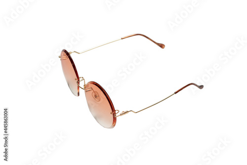 Round summer sunglasses isolated on a white background.