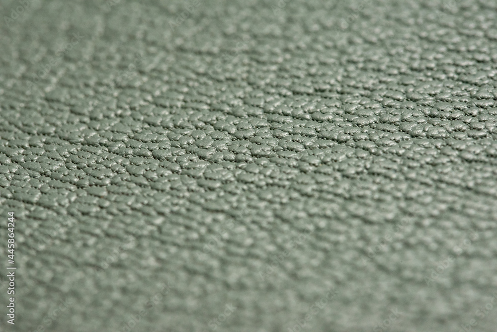 A close-up shot of the surface of leather used for handmade A close-up shot of the surface of leather used for handmade