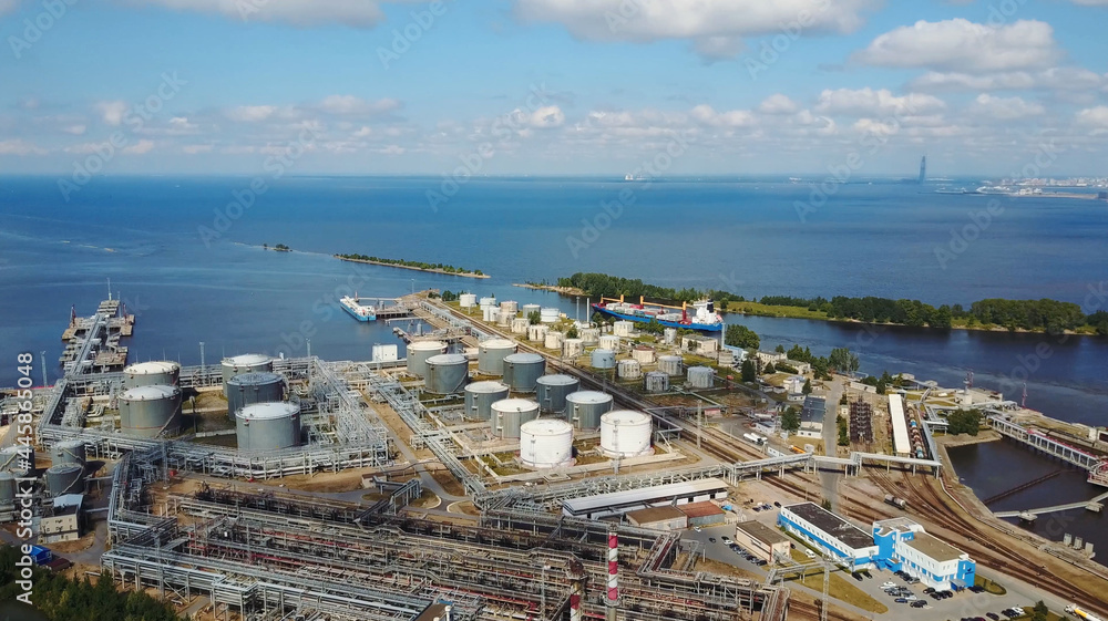 Aerial view of petrol industrial zone and big caro ship