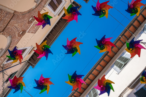 Summer Urban Decoration Colorful Windmill Over Street © salita2010
