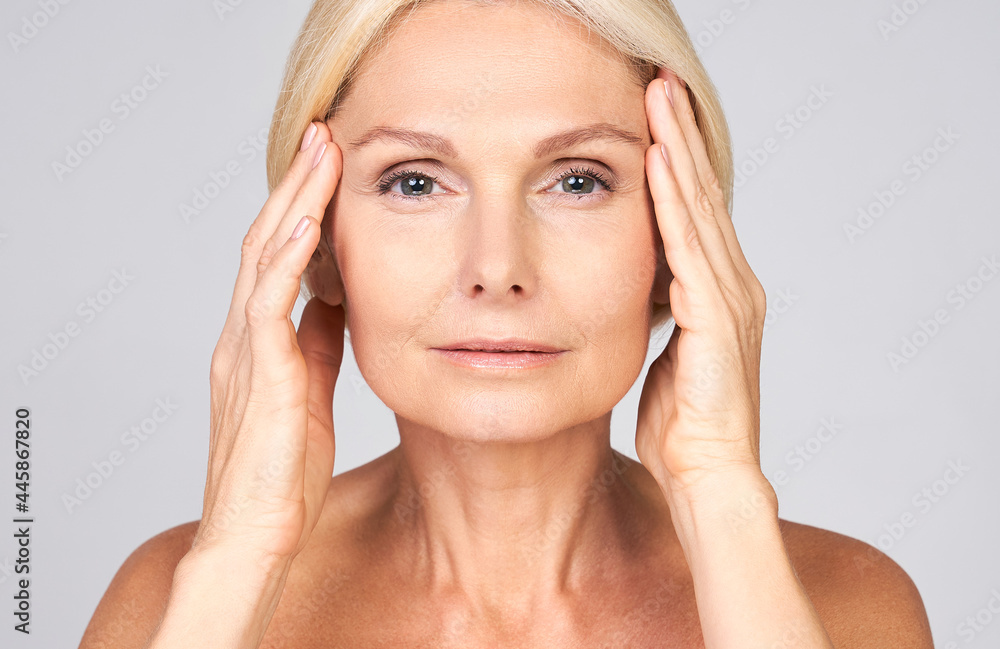 Portrait of an attractive cute Caucasian lady over 50 years old. Portrait of an attractive cute Caucasian lady over 50 years old.