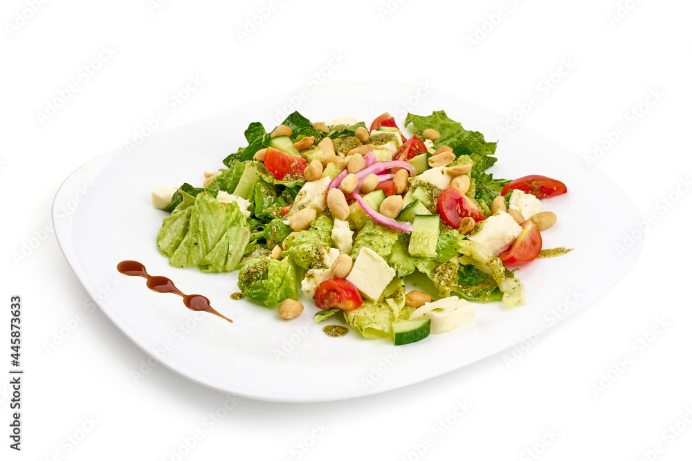 Vegetarian salad with mozzarella cheese, isolated on white background. High resolution image. Vegetarian salad with mozzarella cheese, isolated on white background. High resolution image.
