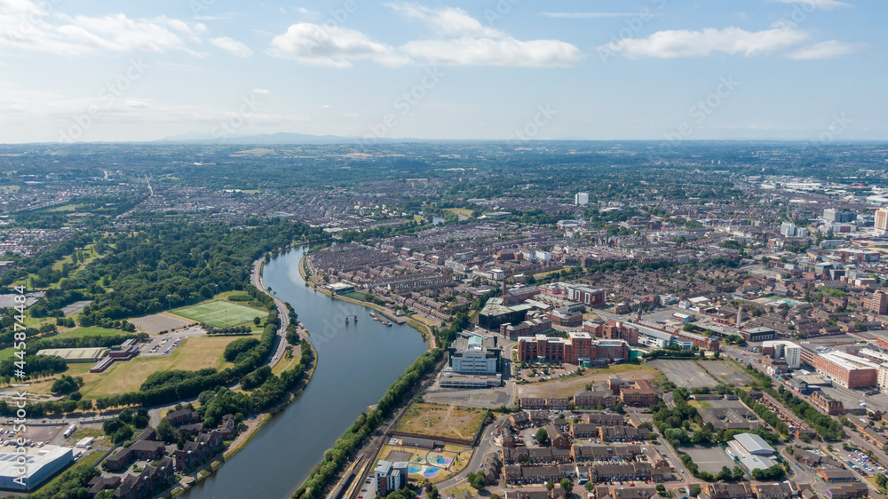 Aerial view on river and buildings in City center of Belfast Northern Ireland. Drone photo, high angle view of town Aerial view on river and buildings in City center of Belfast Northern Ireland. Drone photo, high angle view of town