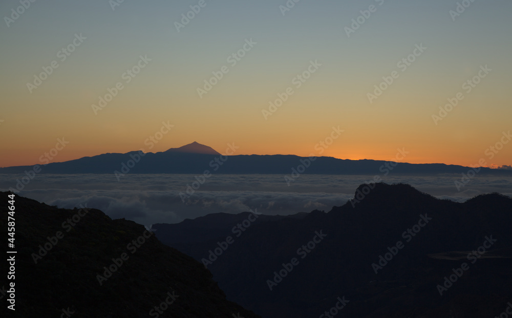 Gran Canaria, landscape of the central part of the island, Las Cumbres, ie The Summits, short hike between rock Formation 
Chimirique and iconic Roque Nublo, evening light