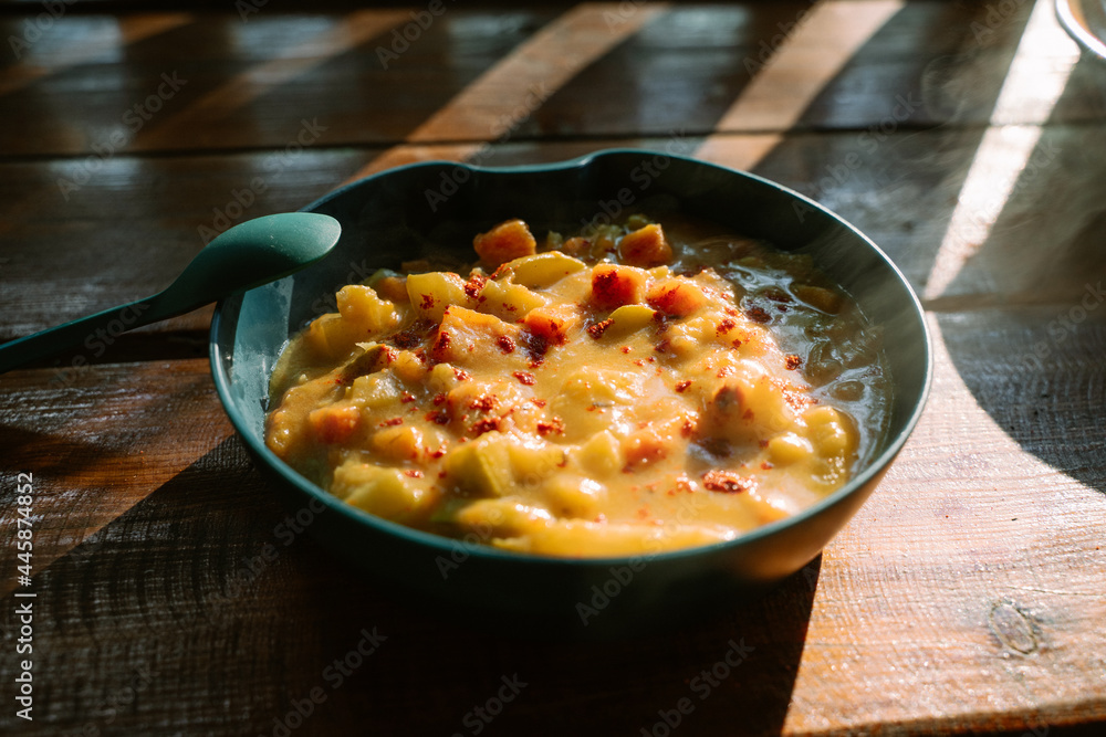 Healthy vegetarian food cooked on the fire. Festival food
