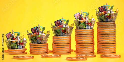Growth of food sales or growth of market basket or consumer price index concept. Shopping basket with foods with coin stacks on yellow background.
