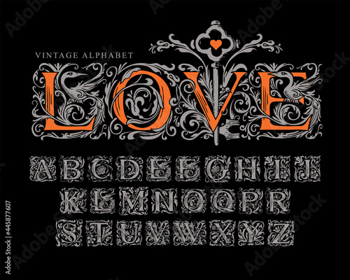 The word LOVE decorated with old key. Vector set of silver initial letters on a black background. Vintage hand-drawn Alphabet. Luxury design of ornate font for monogram, card, invitation, logo, label