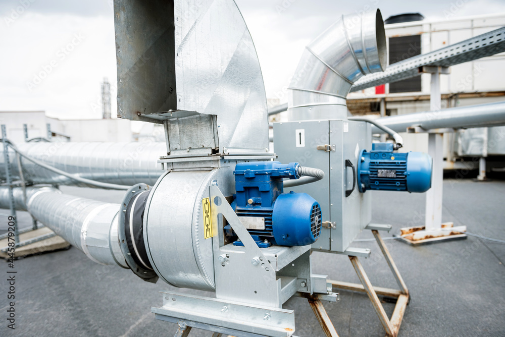 Air conditioners on the roof of an industrial building. HVAC Air conditioners on the roof of an industrial building. HVAC