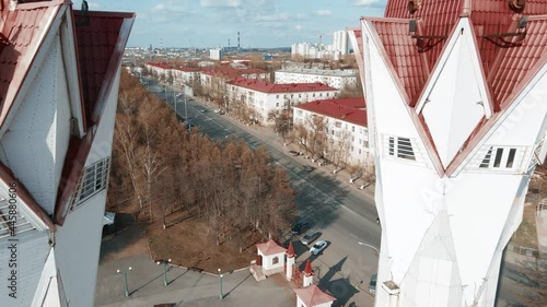 The Tulip Mosque. Ufa sight. A beautiful temple. Red roofs of houses. An architectural monument in the forest. Flying over the mosque. Busy street in Ufa.