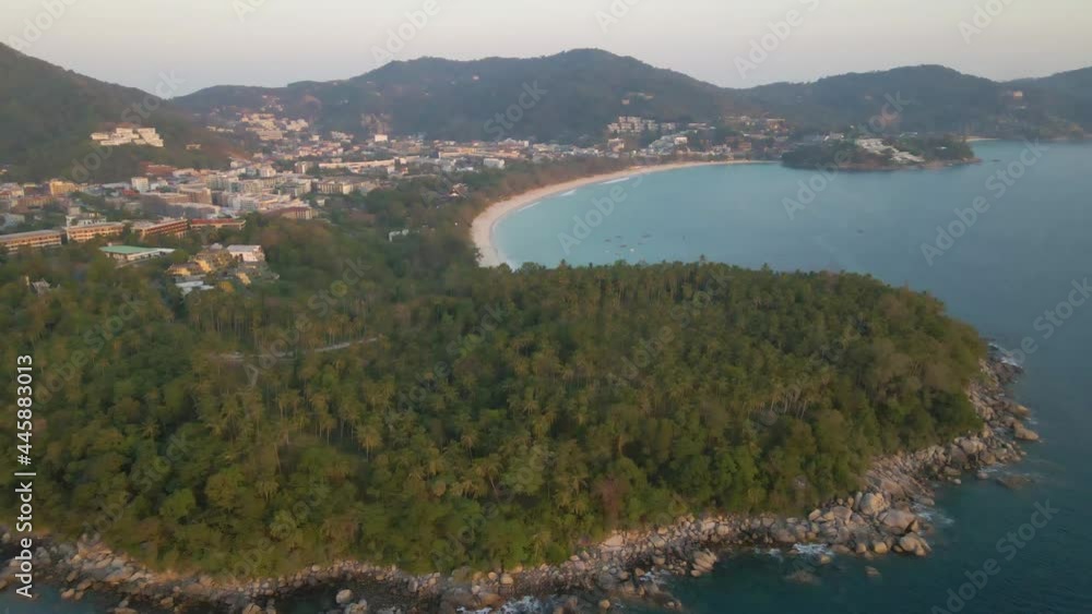 4K Aerial drone side view of Phuket beach, sea and sand. Drone view of a beautiful white tropical sand beach on a summer day in Thailand. Top view empty and clean beach. Kata Beach, Phuket, Thailand 4K Aerial drone side view of Phuket beach, sea and sand. Drone view of a beautiful white tropical sand beach on a summer day in Thailand. Top view empty and clean beach. Kata Beach, Phuket, Thailand