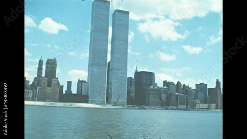 Old Twin Towers skyscrapers and office buildings of New York city. United States America in 1976. Archival of Manhattan skyline, sea view from Hudson river sightseeing cruise.