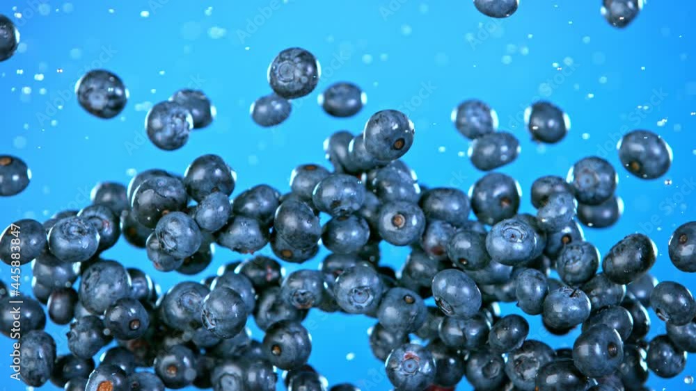 Super Slow Motion Shot of Flying Fresh Blueberries at 1000 fps. Super Slow Motion Shot of Flying Fresh Blueberries at 1000 fps.