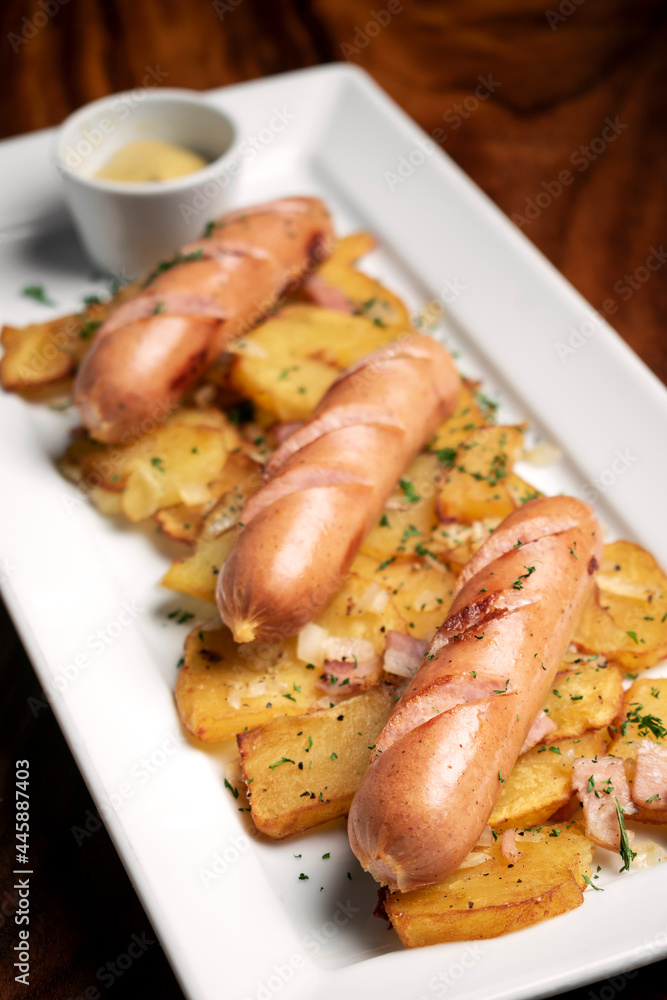 german cheese sausages with fried potato and mustard german cheese sausages with fried potato and mustard