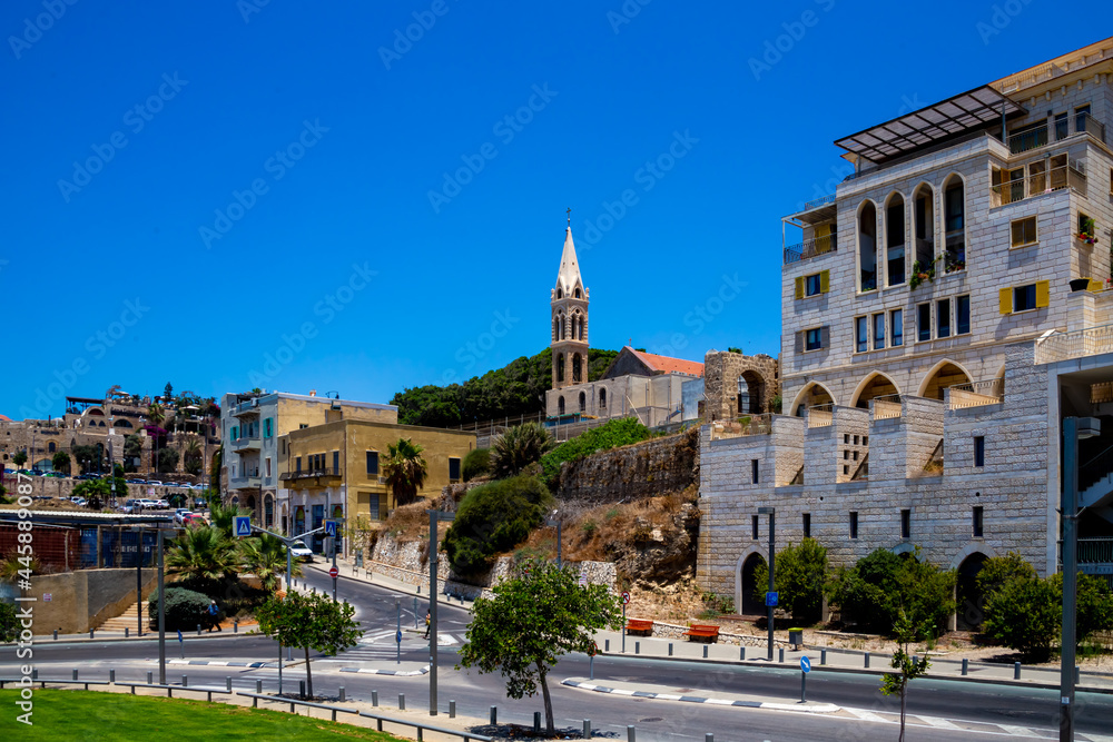 Jaffa, Israel - June 27, 2021: Modern and old houses on the streets of old Jaffa