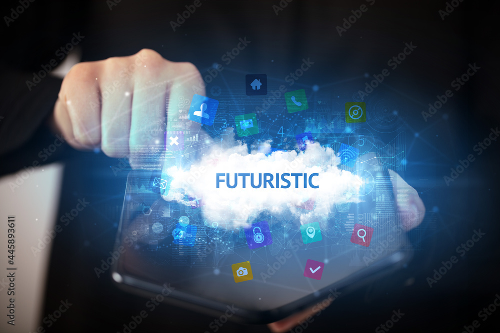 Fototapeta premium Businessman holding a foldable smartphone, technology concept