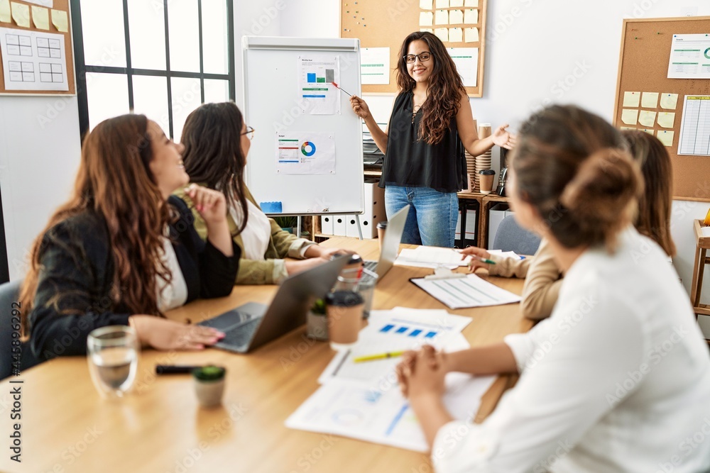 © Krakenimages.com - Group of young businesswomen listening boss conference during meeting at the office.