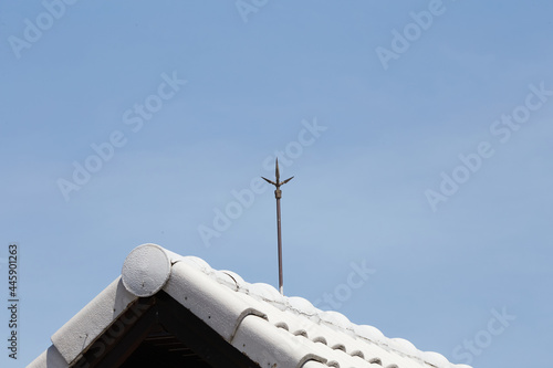 Air terminal rod or Lightning rod on the roof of a building for lightning protection systems and protect electrical equipment damage when raining and lightning strike. photo