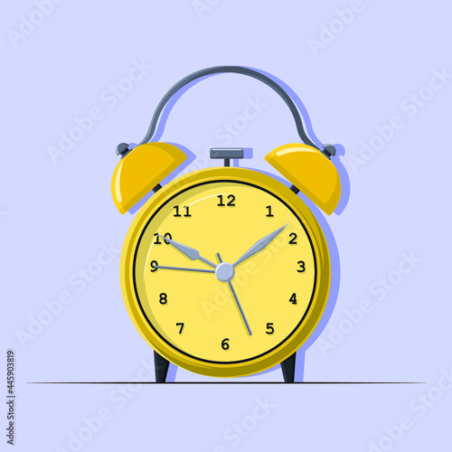Alarm clock. 
Yellow alarm clock.