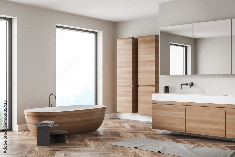 Modern bathroom interior with wood and stone decor elements and big window. Concept of contemporary design and spa relaxation. - obrazy, fototapety, plakaty 