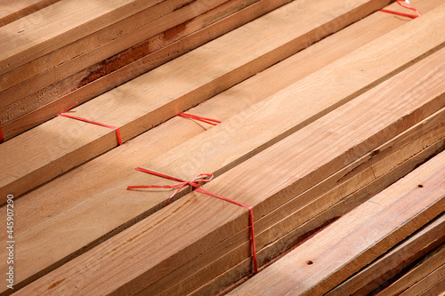 High angle view of wooden planks stack for construction material background