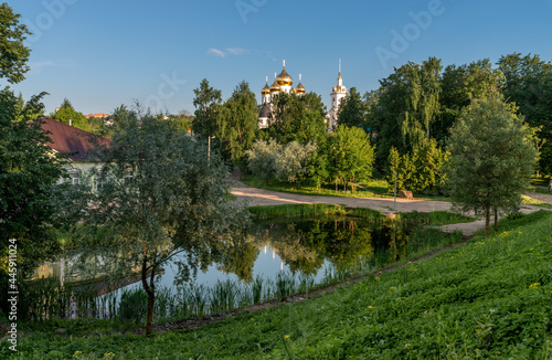 Uspensky Cathedral in Dmitrov near Moscow, Russia, in a park with pond
