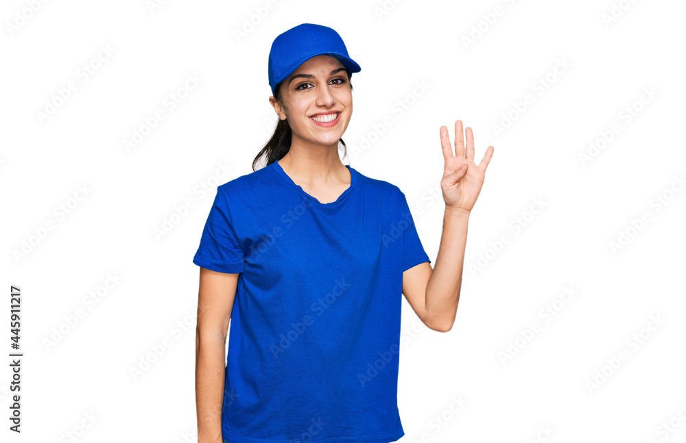 Young hispanic girl wearing delivery courier uniform showing and pointing up with fingers number four while smiling confident and happy.