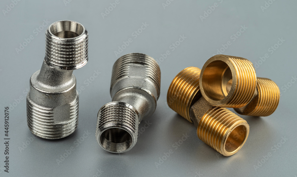 Two pairs of eccentrics connectors in brass and stainless steel. Eccentric mixer adapter faucet. Two pairs of eccentrics connectors in brass and stainless steel. Eccentric mixer adapter faucet.