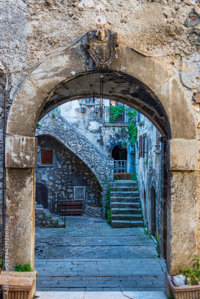 Santo Stefano di Sessanio medieval village details, historical stone buildings, ancient gate, old city stone architecture. Abruzzo, Italy.