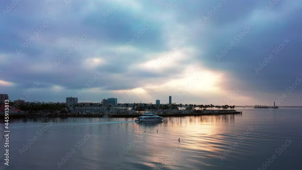 Boat moving across bay in Long Beach California Boat moving across bay in Long Beach California