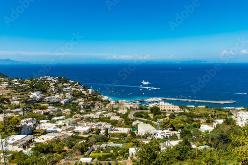 Beautiful panorama of sea and bay on Capri island full of trees and buildings