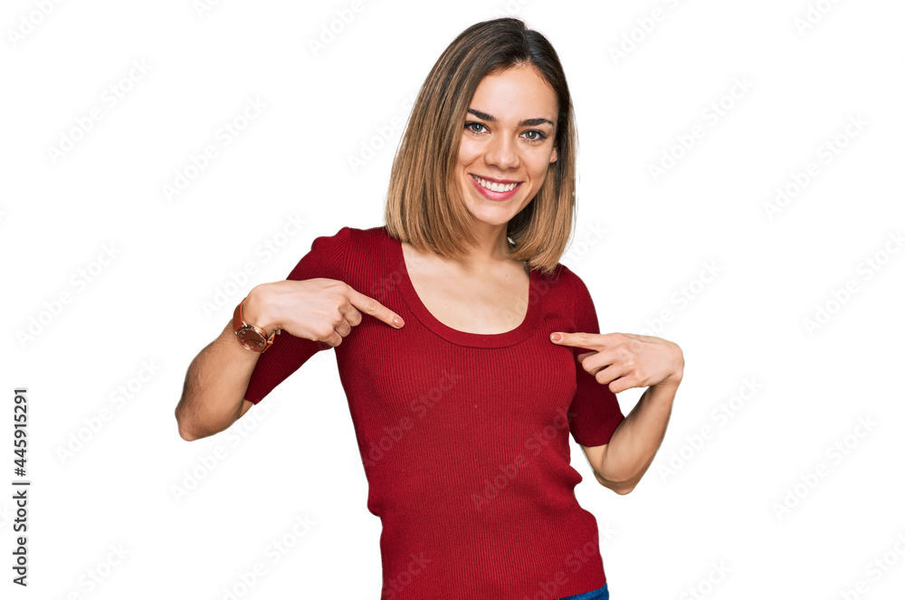 Young blonde girl wearing casual clothes looking confident with smile on face, pointing oneself with fingers proud and happy. Young blonde girl wearing casual clothes looking confident with smile on face, pointing oneself with fingers proud and happy.
