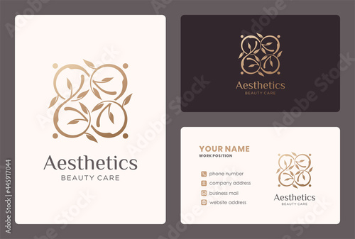 aesthetic logo with leaf branch element and business card design.