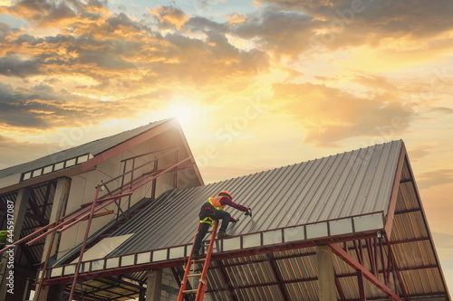 Roofer Construction worker install new roof,Roofing tools