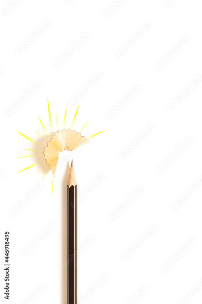 Black pencil with shavings, isolated on white background. Idea, business success concept. Black pencil with shavings, isolated on white background. Idea, business success concept.