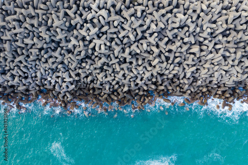 Top down view of the wave breaker over the sea