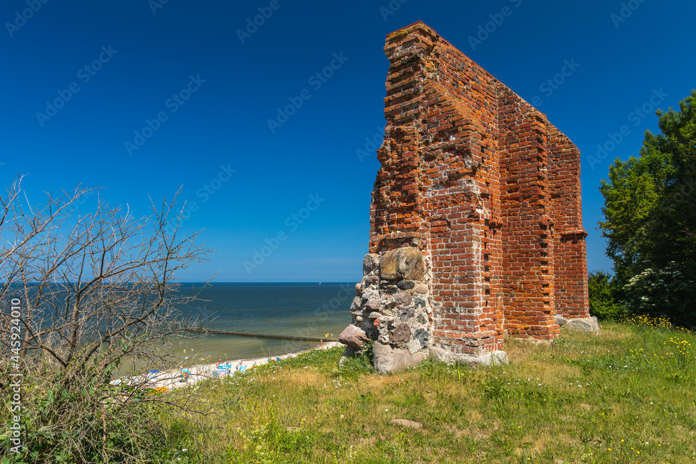 Obraz premium Ruins of the Church of Saint Nicholas from the 15th century in Trzesacz, Poland