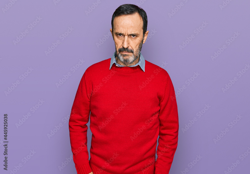 Middle age hispanic man wearing casual clothes skeptic and nervous, frowning upset because of problem. negative person. Middle age hispanic man wearing casual clothes skeptic and nervous, frowning upset because of problem. negative person.